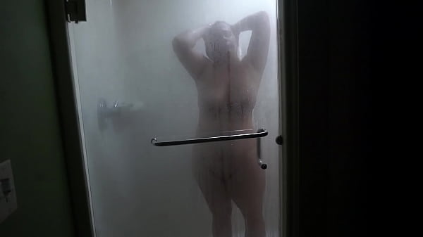nerdy white milf takes quick shower at the hotel