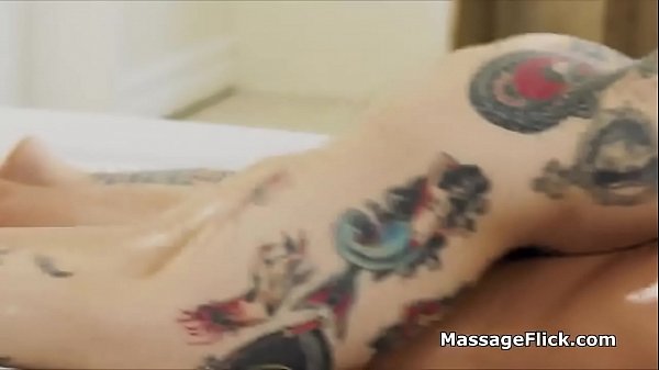 inked masseuse rides cock